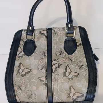 Bolso rígido decorado